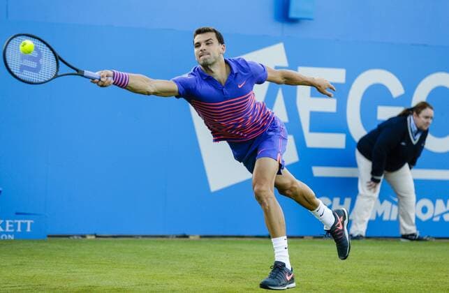 15.06.2015. London, England. Queens Aegon Championship Tennis. Grigor Dimitrov (BUL) versus Sam Query (USA), 1st round match. Grigor Dimitrov in action xCraigxMercerx  ActionPlus11631786