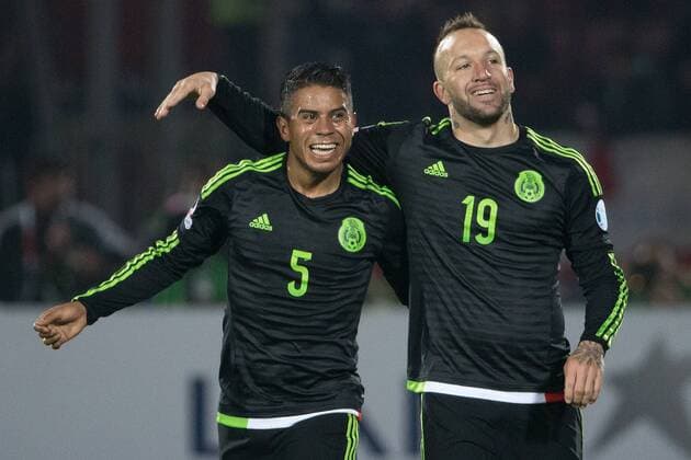 (150616) -- SANTIAGO, June, 2015 -- Matias Vuoso (R) from Mexico celebrates sccoring against Chile during the the Group A match of the Copa America 2015, at the National Stadium, in Santiago, Chile, on June 15, 2015. The match ended with a 3-3 draw. ) (ce) (SP)CHILE-SANTIAGO-COPA AMERICA-CHILE VS MEXICO PEDROxMERA 