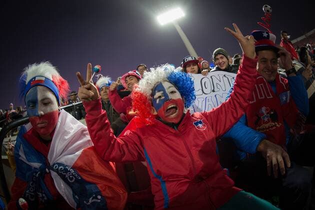 (150616) -- SANTIAGO, June, 2015 -- A fan of Chile reacts prior to the Group A match of the Copa America 2015 between Chile and Mexico, to be held at the National Stadium, in Santiago, Chile, on June 15, 2015. ) (ce) (SP)CHILE-SANTIAGO-COPA AMERICA-CHILE VS MEXICO PEDROxMERA 