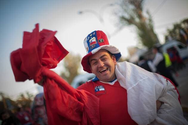 (150616) -- SANTIAGO, June, 2015 -- A fan of Chile reacts prior to the Group A match of the Copa America 2015 between Chile and Mexico, to be held at the National Stadium, in Santiago, Chile, on June 15, 2015. ) (ce) (SP)CHILE-SANTIAGO-COPA AMERICA-CHILE VS MEXICO PEDROxMERA 