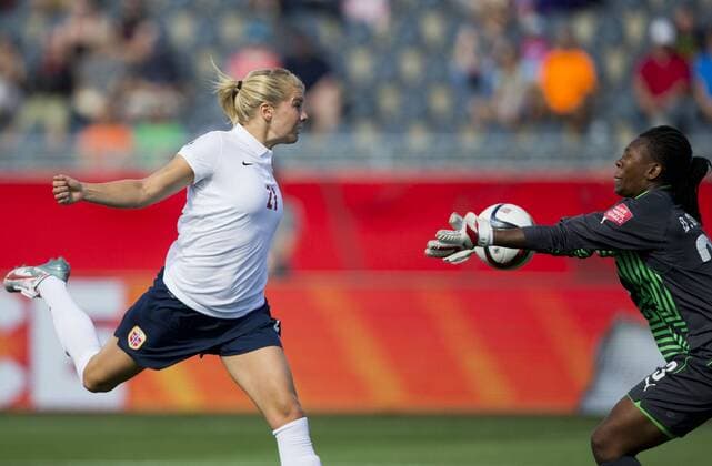 (150615) -- MONCTON, June 15, 2015 -- Ada Hegerberg (L) of Norway heads the ball during the group B match against Cote d Ivoire at the 2015 FIFA Women s World Cup in Moncton, Canada, June 15, 2015. Norway won 3-1 and advanced into the round of 16. ) (SP)CANADA-MONCTON-FIFA WOMEN S WORLD CUP-GROUP B-NORWAY VS COTE D IVOIRE ZouxZheng 