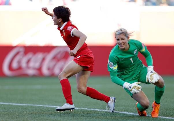 WINNIPEG, June 15, 2015 -- Wang Shanshan (L) of China celebrates during the Group A match against New Zealand at the Winnipeg Stadium in Winnipeg, Canada, on June 15, 2015. The match ended with a 2-2 draw. China advanced to the round of 16. ) (SP)CANADA-WINNIPEG-FIFA WOMEN S WORLD CUP-CHN VS NZL WangxLili 