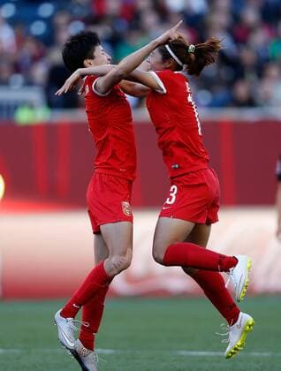 WINNIPEG, June 15, 2015 -- Wang Shanshan (L) of China celebrates during the Group A match against New Zealand at the Winnipeg Stadium in Winnipeg, Canada, on June 15, 2015. The match ended with a 2-2 draw. China advanced to the round of 16. ) (SP)CANADA-WINNIPEG-FIFA WOMEN S WORLD CUP-CHN VS NZL WangxLili 