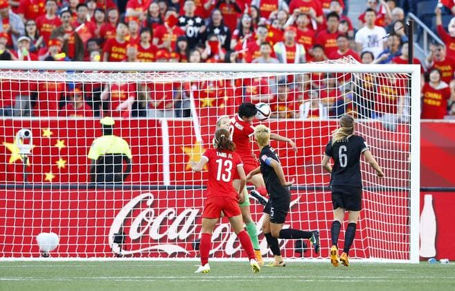 WINNIPEG, June 15, 2015 -- Wang Shanshan (above) of China heads the ball to score during the Group A match against New Zealand at the Winnipeg Stadium in Winnipeg, Canada, on June 15, 2015. The match ended with a 2-2 draw. China advanced to the round of 16. ) (SP)CANADA-WINNIPEG-FIFA WOMEN S WORLD CUP-CHN VS NZL DingxXu 