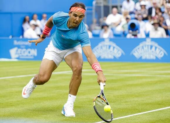16.06.2015. London, England. Queens Aegon Championship Tennis. Rafa Nadal (ESP) versus Alexandr Dolgopolov (UKR), 1st round match. Rafa Nadal in action xCraigxMercerx  ActionPlus11632042
