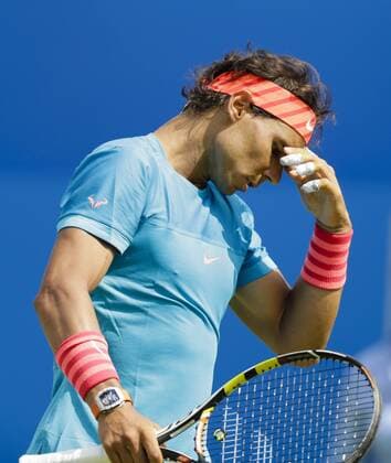 16.06.2015. London, England. Queens Aegon Championship Tennis. Rafa Nadal (ESP) versus Alexandr Dolgopolov (UKR), 1st round match. Rafa Nadal reacts during the game xCraigxMercerx  ActionPlus11632044