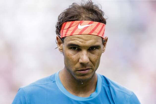 16.06.2015. London, England. Queens Aegon Championship Tennis. Rafa Nadal (ESP) versus Alexandr Dolgopolov (UKR), 1st round match. Rafa Nadal looks dejected during the game xCraigxMercerx  ActionPlus11632058