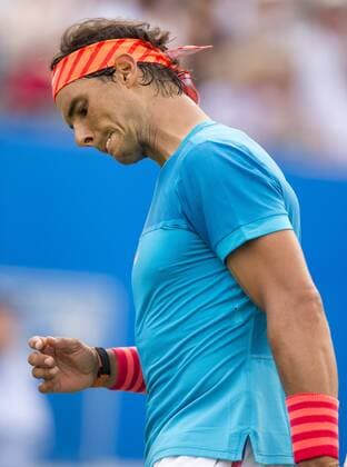 16.06.2015. London, England. Queens Aegon Championship Tennis. A grimace from Rafael Nadal (ESP) as he faces defeat in the first round. xNigelxCookex  ActionPlus11632060