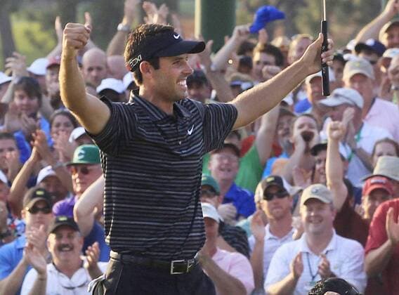 AUGUSTA, United States - Charl Schwartzel of South Africa clenches his fist after sinking a birdie putt on the 18th hole to win the Masters golf tournament at the Augusta National Golf Club in Georgia on April 10, 2011. Schwartzel shot a 274 total, 14-under, to claim the Green Jacket.  0411061