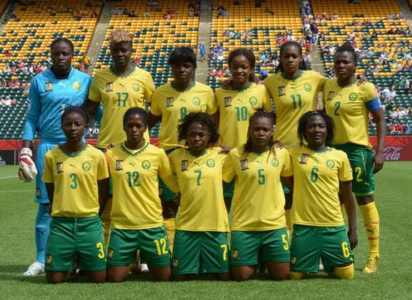 16 JUNE 2015: Cameroon s players pose for there team photo before action against Switzerland at the FIFA Womens World Cup at Commonwealth Stadium in Edmonton, Alberta, Canada. SOCCER: JUN 16 FIFA Women s World Cup - Group C - Switzerland v Cameroon Icon20150611005 EDITORIAL USE ONLY