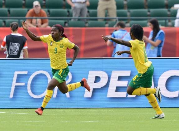 16 JUNE 2015: Cameroon s Madeleine Ngono (9) celebrates with her team after scoring the second goal of the game against Switzerland at the FIFA Womens World Cup at Commonwealth Stadium in Edmonton, Alberta, Canada. SOCCER: JUN 16 FIFA Women s World Cup - Group C - Switzerland v Cameroon Icon20150611012 EDITORIAL USE ONLY