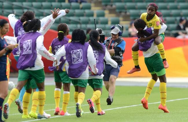 16 JUNE 2015: Cameroon s Madeleine Ngono (9) celebrates with her team after scoring the second goal of the game against Switzerland at the FIFA Womens World Cup at Commonwealth Stadium in Edmonton, Alberta, Canada. SOCCER: JUN 16 FIFA Women s World Cup - Group C - Switzerland v Cameroon Icon20150611014 EDITORIAL USE ONLY