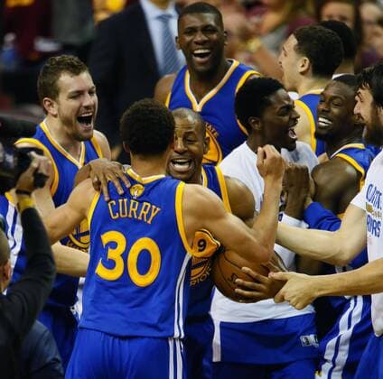 June 16, 2015 - Cleveland, OH, USA - The Golden State Warriors Stephen Curry (30) celebrates with teammate Andre Iguodala (9) and the rest of the team after time ran out during the fourth quarter against the Cleveland Cavaliers in Game 6 of the NBA Basketball Herren USA Finals at Quicken Loans Arena in Cleveland on Tuesday, June 16, 2015. The Warriors won, 105-97, to clinch the championship. NBA Finals: Golden State at Cleveland, Game 6 - ZUMAm67_