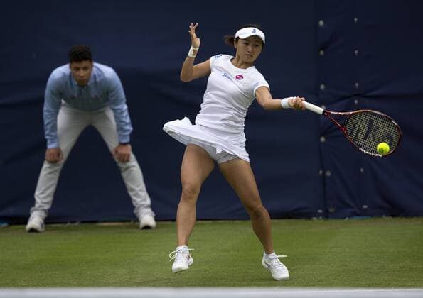 17 June 2015: Misaki Doi (JPN) in action during her defeat by Christina McHale (USA) in their WomenÕs Singles Second Round during the Aegon Classic at Edgbaston Priory Club in Birmingham, Great Britain. - Christina McHale (USA) def Q Misaki Doi (JPN) 6-3 6-4. TENNIS: JUN 17 Aegon Classic Birmingham Icon1506173207 EDITORIAL USE ONLY