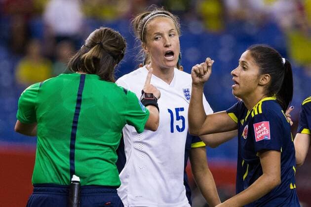 June 17, 2015 : Colombia midfielder Carolina Arias 17 and England defender Casey Stoney 15 argue with the referee Carol Anne Chenard during the 2015 FIFA Women s World Cup Group F match between England and Colombia at the Olympic Stadium in Montreal, Quebec, Canada. SOCCER: JUN 17 FIFA Women s World Cup - Group F - England v Colombia Icon15061713 EDITORIAL USE ONLY