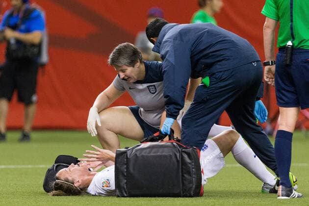 June 17, 2015 : England defender Casey Stoney 15 speaks with medical staff during the 2015 FIFA Women s World Cup Group F match between England and Colombia at the Olympic Stadium in Montreal, Quebec, Canada. SOCCER: JUN 17 FIFA Women s World Cup - Group F - England v Colombia Icon15061722 EDITORIAL USE ONLY