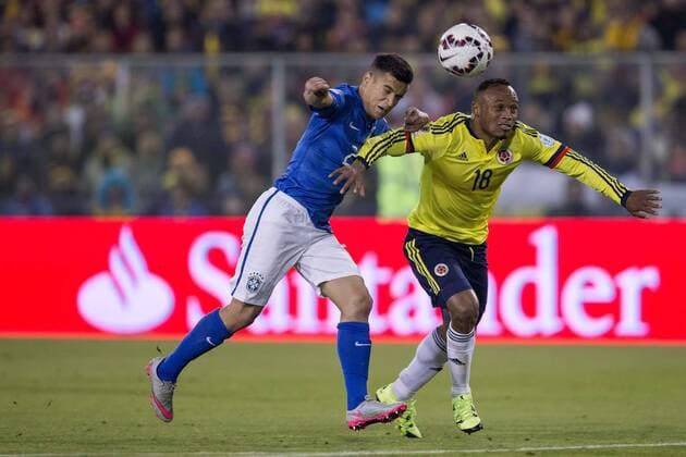 Brazil vs Colombia SANTIAGO, SC - 17 06 2015: BRAZIL X COLOMBIA - Philippe Coutinho Brazil s cotiontion ball Juan Camilo Zuniga of Colombia during the match between Brazil vs Colombia, valid for the second round of the first phase of Group C of the Copa America 2015, held at the Monumental Stadium David Arellano. (Photo: Marcelo Machado de Melo FotoArena)  MarceloxMachadoxdexMelo