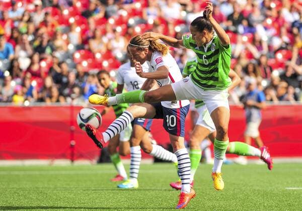 June 17, 2015: Camile Abily ( 10) of France is denied by Jennifer Ruiz ( 6) of Mexico during the FIFA 2015 Women s World Cup Group F match between Mexico and France at Lansdowne Stadium in Ottawa, Canada. France won 5-0 to progress to the knockout stages. SOCCER: JUN 17 FIFA Women s World Cup - Group F - Mexico v France Icon15061700012 EDITORIAL USE ONLY