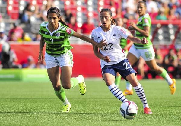 June 17, 2015: Defender Christina Murillo ( 3) of Mexico tries to hold back Amel Majri ( 22) of France during the FIFA 2015 Women s World Cup Group F match between Mexico and France at Lansdowne Stadium in Ottawa, Canada. SOCCER: JUN 17 FIFA Women s World Cup - Group F - Mexico v France Icon15061700022 EDITORIAL USE ONLY