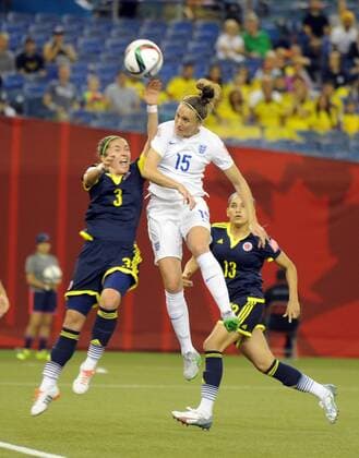 MONTREAL, June 17, 2015 -- Natalia Gaitan (L) of Colombia vies with Casey Stoney of England during the Group F match at the 2015 FIFA Women s World Cup in Montreal, Canada, on June 17, 2015. England won 2-1. ) (SP)CANADA-MONTREAL-FIFA WOMEN S WORLD CUP-ENGLAND VS COLOMBIA KadrixMohamed 