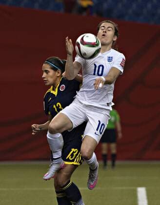 MONTREAL, June 17, 2015 -- England s Karen Carney (R) vies with Colombia s Angela Clavijo during the Group F match at the 2015 FIFA Women s World Cup in Montreal, Canada, on June 17, 2015. England won 2-1. ) (SP)CANADA-MONTREAL-FIFA WOMEN S WORLD CUP-ENGLAND VS COLOMBIA AndrewxSoong 