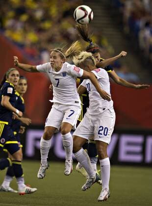MONTREAL, June 17, 2015 -- England s Jordon Nobbs (L) and Lianne Sanderson (R) vies with Colombia s Lady Andrade during the Group F match at the 2015 FIFA Women s World Cup in Montreal, Canada, on June 17, 2015. England won 2-1. ) (SP)CANADA-MONTREAL-FIFA WOMEN S WORLD CUP-ENGLAND VS COLOMBIA AndrewxSoong 