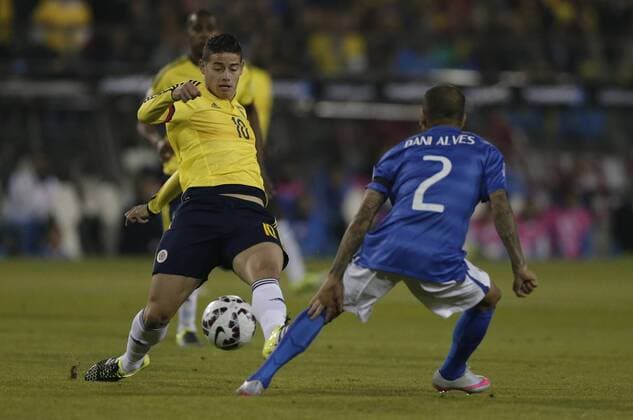 SANTIAGO, June 17, 2015 -- Dani Alves (R) of Brazil vies for the ball with James Rodriguez of Colombia during the Group C match of the Copa America Chile 2015, at the Estadio Monumental, in Santiago, Chile, on June 17, 2015. ) (ce) (SP)CHILE-SANTIAGO-COPA AMERICA-BRAZIL VS COLOMBIA GuillermoxArias 