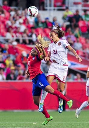 June 17, 2015: Midfielder Cho Sohyun ( 8) of Korea Republic and Alexia Putellas ( 21) of Spain battle for the ball in the air during the FIFA 2015 Women s World Cup Group E match between Korea and Spain at Lansdowne Stadium in Ottawa, Canada. Korea recovered from a 1-0 deficit at half time to win 2-1 and progress to the knockout stages. SOCCER: JUN 17 FIFA Women s World Cup - Group E - Korea v Spain Icon15061700017 EDITORIAL USE ONLY