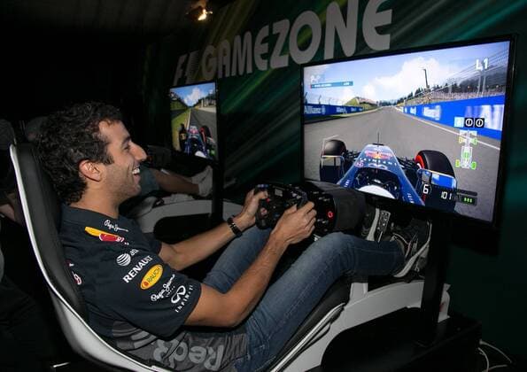 FORMULA 1 - GP of Austria 2015 SPIELBERG,AUSTRIA,18.JUN.15 - MOTORSPORTS, FORMULA 1 - Grand Prix of Austria, Red Bull Ring, preview. Image shows Daniel Ricciardo (AUS Infiniti Red Bull Racing) at the gamezone. GEPAxpictures xHaraldxSteiner
