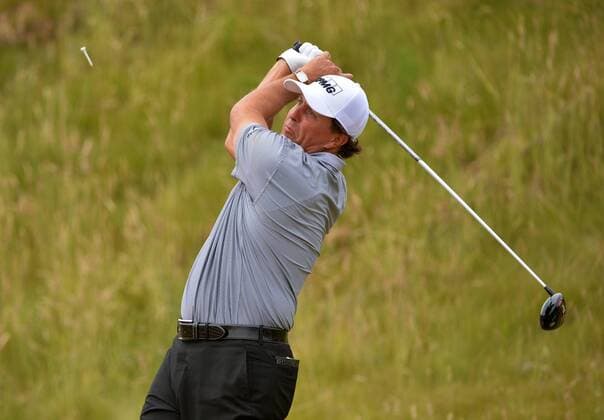 Phil Mickelson makes his tee shot on the seventh hole of the 115th U.S. Open Championship at Chambers Bay on June 18, 2015 in University Place, Washington.  SEA20150618221 KEVINxDIETSCH