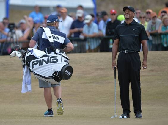 Tiger Woods (R) laughs with Hunter Mahan s caddie John Wood at the beginning of round one of the 115th U.S. Open Championship at Chambers Bay on June 18, 2015 in University Place, Washington.  SEA20150618287 KEVINxDIETSCH