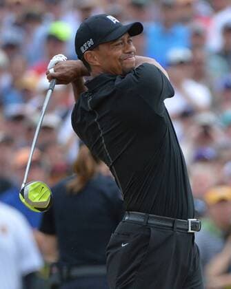 Tiger Woods tees off on the first hole of round one of the 115th U.S. Open Championship at Chambers Bay on June 18, 2015 in University Place, Washington.  SEA20150618289 KEVINxDIETSCH