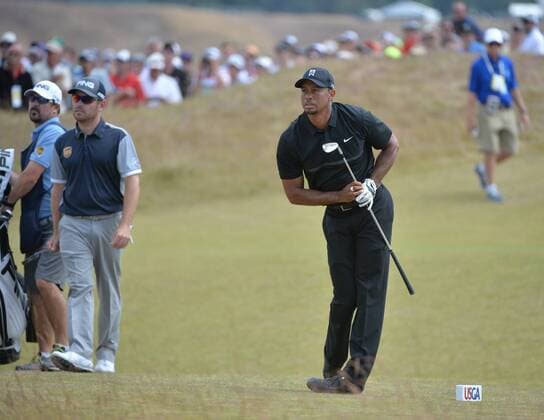 Tiger Woods watches his tee shot on the third hole of round one of the 115th U.S. Open Championship at Chambers Bay on June 18, 2015 in University Place, Washington.  SEA201506182101 KEVINxDIETSCH