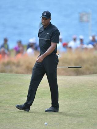 Tiger Woods looks at his missed putt on the third hole of round one of the 115th U.S. Open Championship at Chambers Bay on June 18, 2015 in University Place, Washington.  SEA201506182102 KEVINxDIETSCH