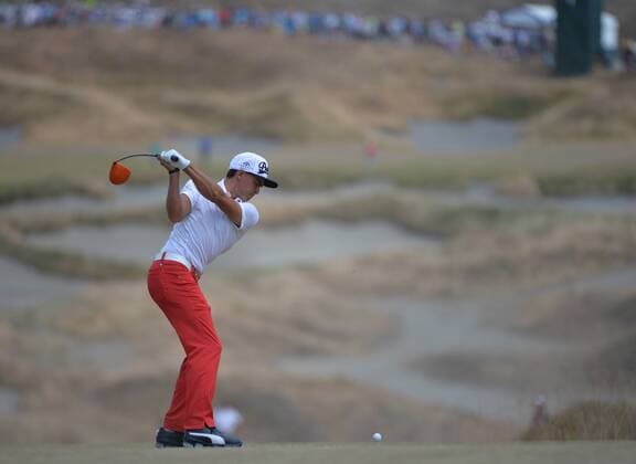 Rickey Fowler tees off on the fourth hole of round one of the 115th U.S. Open Championship at Chambers Bay on June 18, 2015 in University Place, Washington.  SEA201506182103 KEVINxDIETSCH