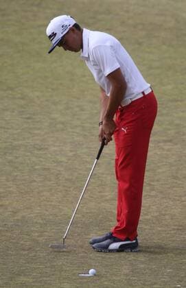 Rickey Fowler lips the cup and misses a short putt on the ninth green in round one of the 115th U.S. Open Championship at Chambers Bay on June 18, 2015 in University Place, Washington. Fowler took a double bogey on the hole.  SEA201506182117 JIMxBRYANT