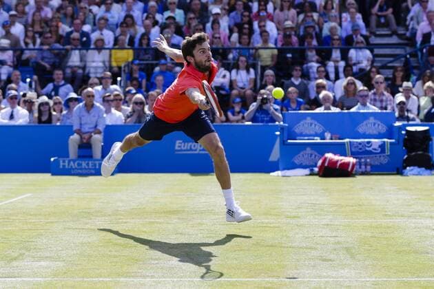 Aktuell Tennis, ATP Turnier im Queen s Club 19.06.2015. London, England. Queens Aegon Championship Tennis. Milos Raonic (CAN) versus Gilles Simon (FRA), Quarter Final match. Gilles Simon in action xCraigxMercerx  ActionPlus11633246