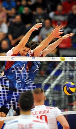 Czech players Jakub Vesely, left, and Adam Bartos block a ball during the match of the group D of the Volleyball World League Czech Republic vs France in Ceske Budejovice, Czech Republic, June 19, 2015. (CTKxPhoto VaclavxPancer) CTKPhotoP201506190862601  VPC_04