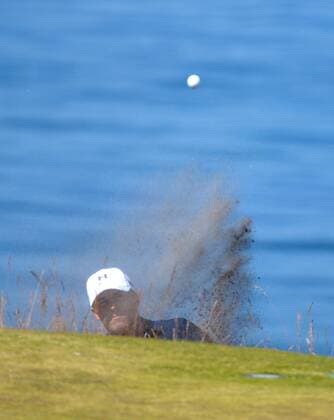 Jordan Spieth plays out of the sand on the 16th hole in the second round of the 115th U.S. Open Championship at Chambers Bay on June 19, 2015 in University Place, Washington.  SEA20150619023 KEVINxDIETSCH