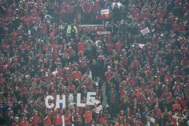 X Chile Bolivia SANTIAGO, CHILE - 06 19 2015: CHILE X BOLIVIA - fans at the match between Chile x Bolivia, valid for the third round of the first group phase of the Copa America 2015 held at the National Stadium Julio Mart?nez Pr?danos. (Photo: Marcelo Machado de Melo FotoArena)  MarceloxMachadoxdexMelo