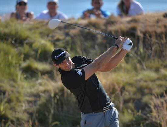 Dustin Johnson hits off the 11th tee in the second round of the 115th U.S. Open Championship at Chambers Bay on June 19, 2015 in University Place, Washington.  SEA20150619071 KEVINxDIETSCH