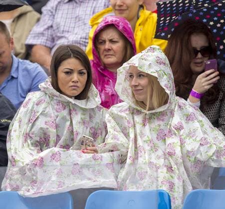 20.06.2015. London, England. Queens Aegon Championship Tennis. Some fans obviously came prepared for rain as the start of play is delayed on semi finals day. xNigelxCookex  ActionPlus11633546