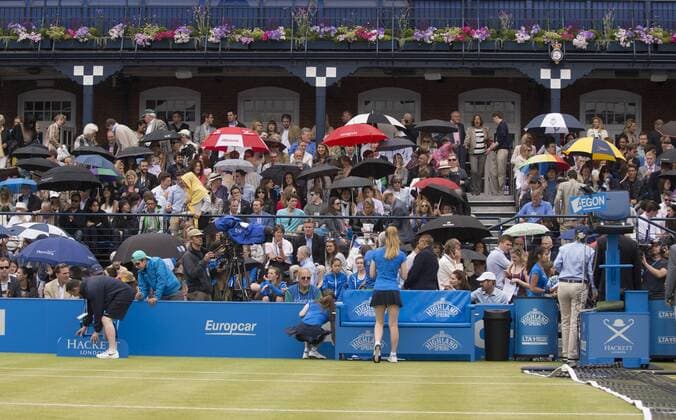 20.06.2015. London, England. Queens Aegon Championship Tennis. The umbrellas are out as rain delays the start of semi final day at Queens. xNigelxCookex  ActionPlus11633549