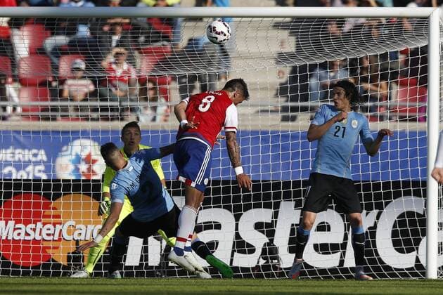 Football , Uruguay v Paraguay Copa America 2015 . Paraguay s Lucas Barrios, right, scores his goal against Uruguay during the match of group B of the 2015 Copa America at La Serena stadium. Rancagua, Chile. 20 06 2015 Marcelo Hernandez Photosport Uruguay v Paraguay, Copa America 2015. 