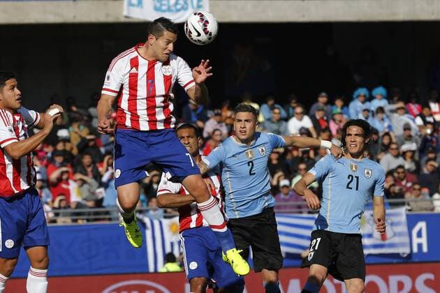 Football , Uruguay v Paraguay Copa America 2015 . Paraguay s Raul Bobadilla play the ball against Uruguay during the match of group B of the 2015 Copa America at La Serena stadium, Chile. 20 06 2015 Marcelo Hernandez Photosport Uruguay v Paraguay, Copa America 2015. 
