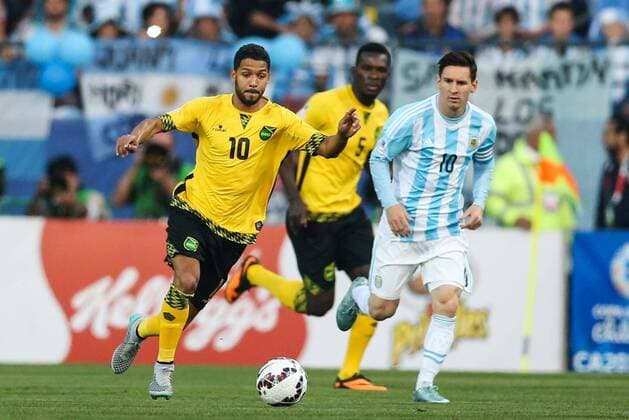 Football , Argentina v Jamaica Copa America 2015 . Argentina s player Lionel Messi battles for the ball against Joel McAnuff of Jamaica during the group B of the 2015 Copa America football match held at the Sausalito stadium in Vina del Mar, Chile. 20 06 2015 Jonathan Mancilla Photosport Argentina v Jamaica, Copa America 2015. 