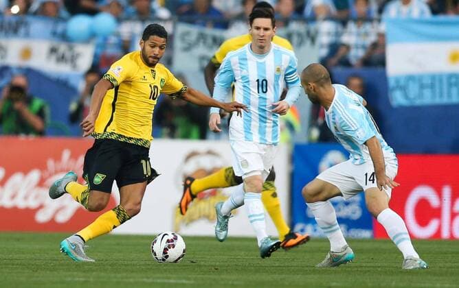 Football , Argentina v Jamaica Copa America 2015 . Argentina s player Javier Mascherano battles for the ball against Joel McAnuff of Jamaica during the group B of the 2015 Copa America football match held at the Sausalito stadium in Vina del Mar, Chile. 20 06 2015 Jonathan Mancilla Photosport Argentina v Jamaica, Copa America 2015. 