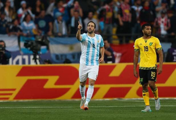 Football , Argentina v Jamaica Copa America 2015 . Argentina s player Gonzalo Higuain celebrates with teammates scoring against Jamaica during the group B of the 2015 Copa America football match held at the Sausalito stadium in Vina del Mar, Chile. 20 06 2015 Jonathan Mancilla Photosport Argentina v Jamaica, Copa America 2015. 