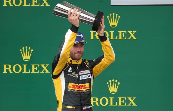 MOTORSPORTS - Porsche Super Cup 2015 SPIELBERG,AUSTRIA,21.JUN.15 - MOTORSPORTS - Porsche Supercup, Red Bull Ring, award ceremony. Image shows the rejoicing of Philipp Eng (AUT). Keywords: trophy. GEPAxpictures xChristianxWalgram