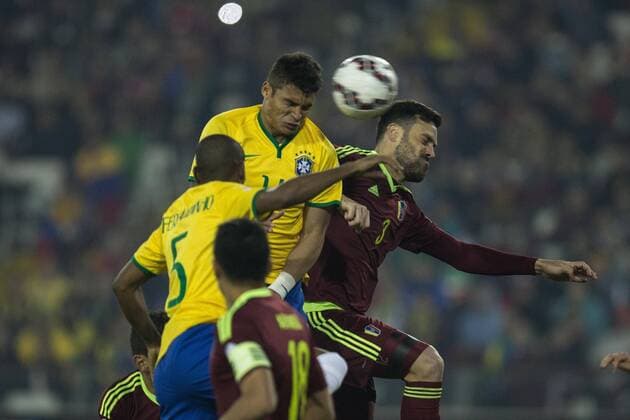 Brazil vs Venezuela SANTIAGO, CHILE - 06 21 2015: BRAZIL X VENEZUELA - Thiago Silva of Brazil dispute ball A. Tune Venezuela during the match between Brazil vs Venezuela, valid for the third round of the first phase of Group C of the Copa America 2015, held at the Monumental Stadium David Arellano. (Photo: Marcelo Machado de Melo FotoArena)  MarceloxMachadoxdexMelo